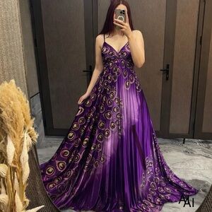 Women Peacock Sleeves Dress Size XS- S? Hard to read size tag 100% Polyester.